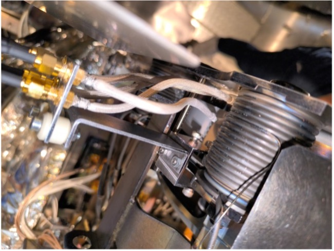 Figure 2: Photograph of the Langmuir probes and their holder fixed the PPS®20k structure.